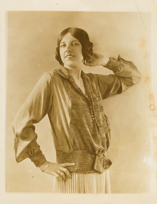 Untitled (Model in Charming Blouse with Chim Ring Front)